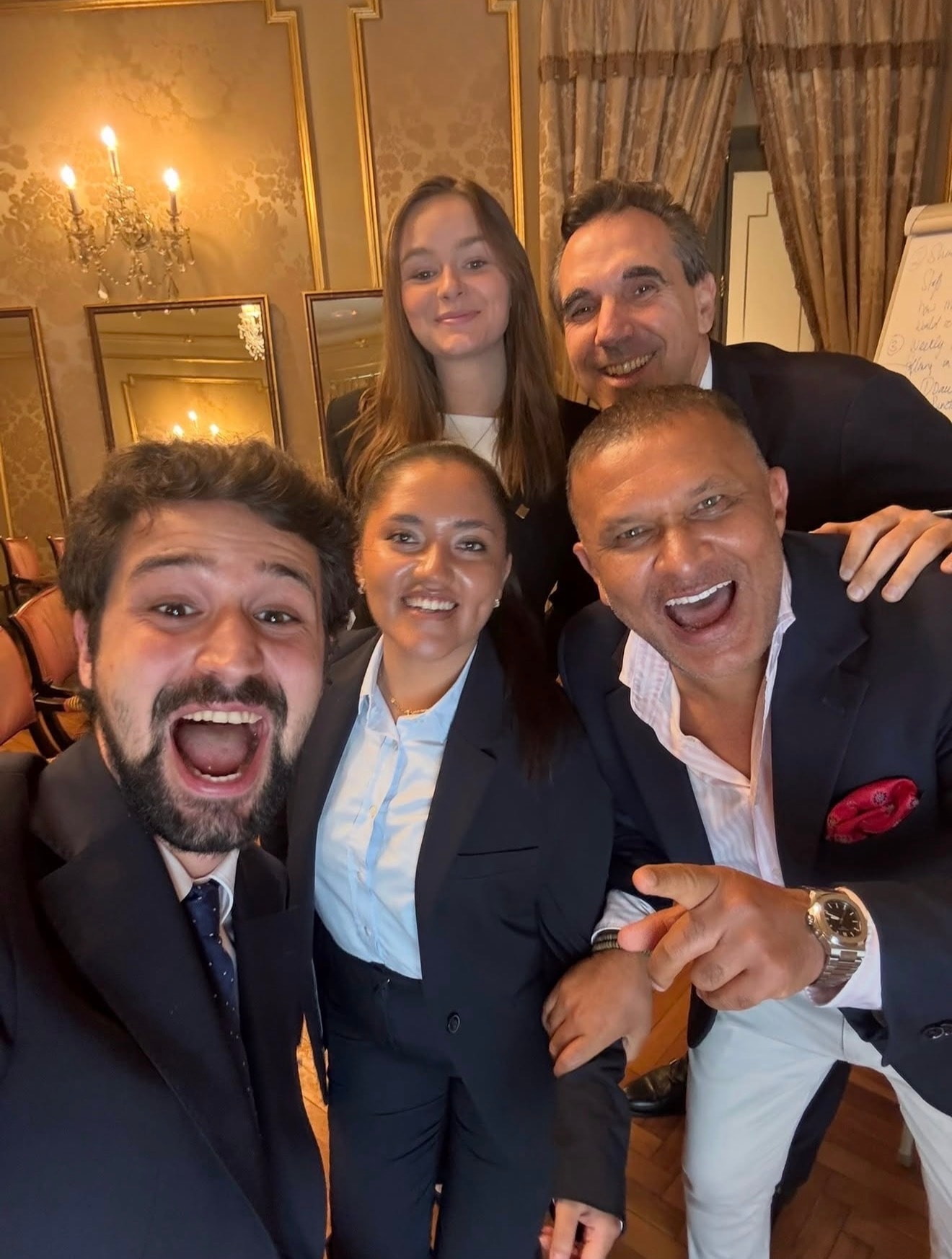 Dubai Life Coach Lee Levy with client staff at El Palace Hotel Barcelona